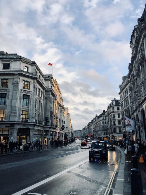 Free A vibrant scene on Regent Street, London with busy traffic and iconic architecture at dusk. Stock Photo