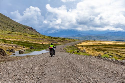Free Explore the rugged trails of Neuquén, Argentina, on a thrilling motorcycle journey. Stock Photo