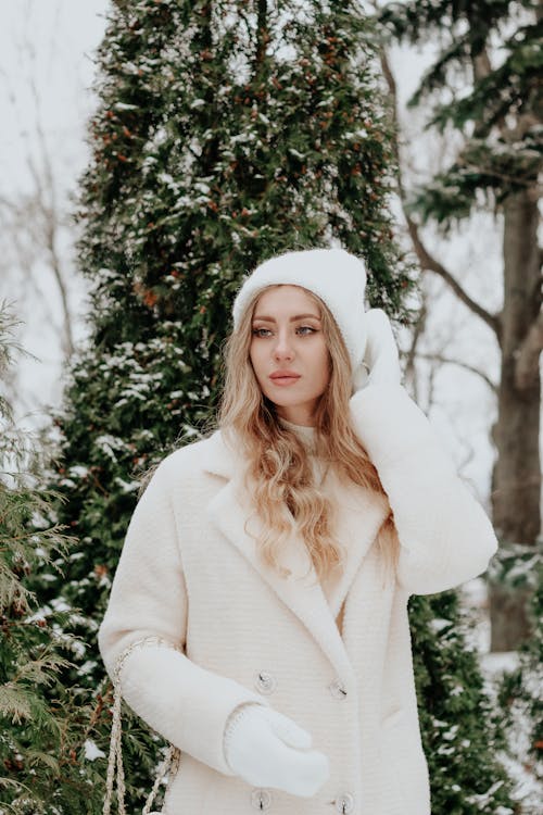 Portrait of a Woman Wearing a Coat and a Hat 