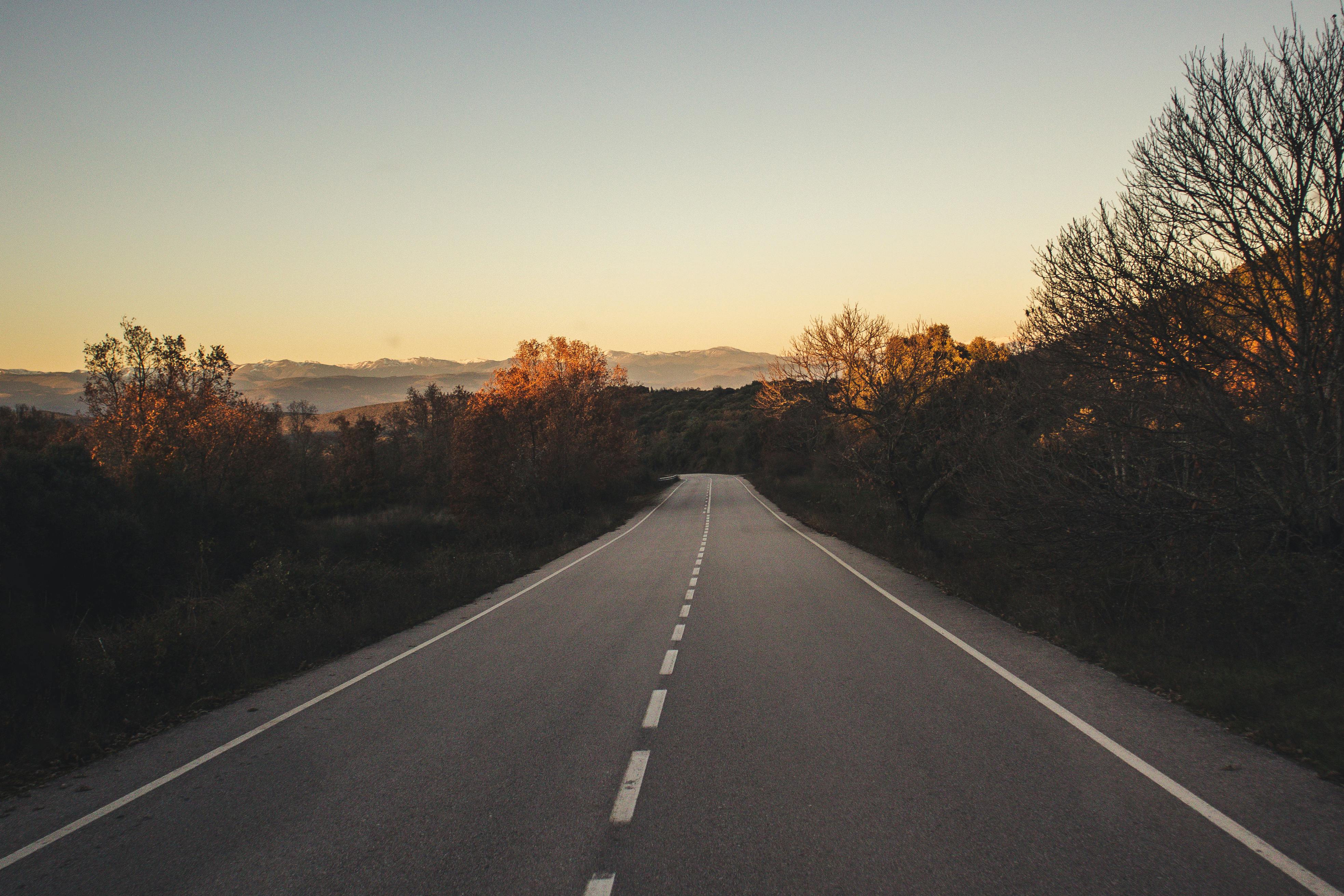 Closeup Photo of Gray Pavement Road · Free Stock Photo