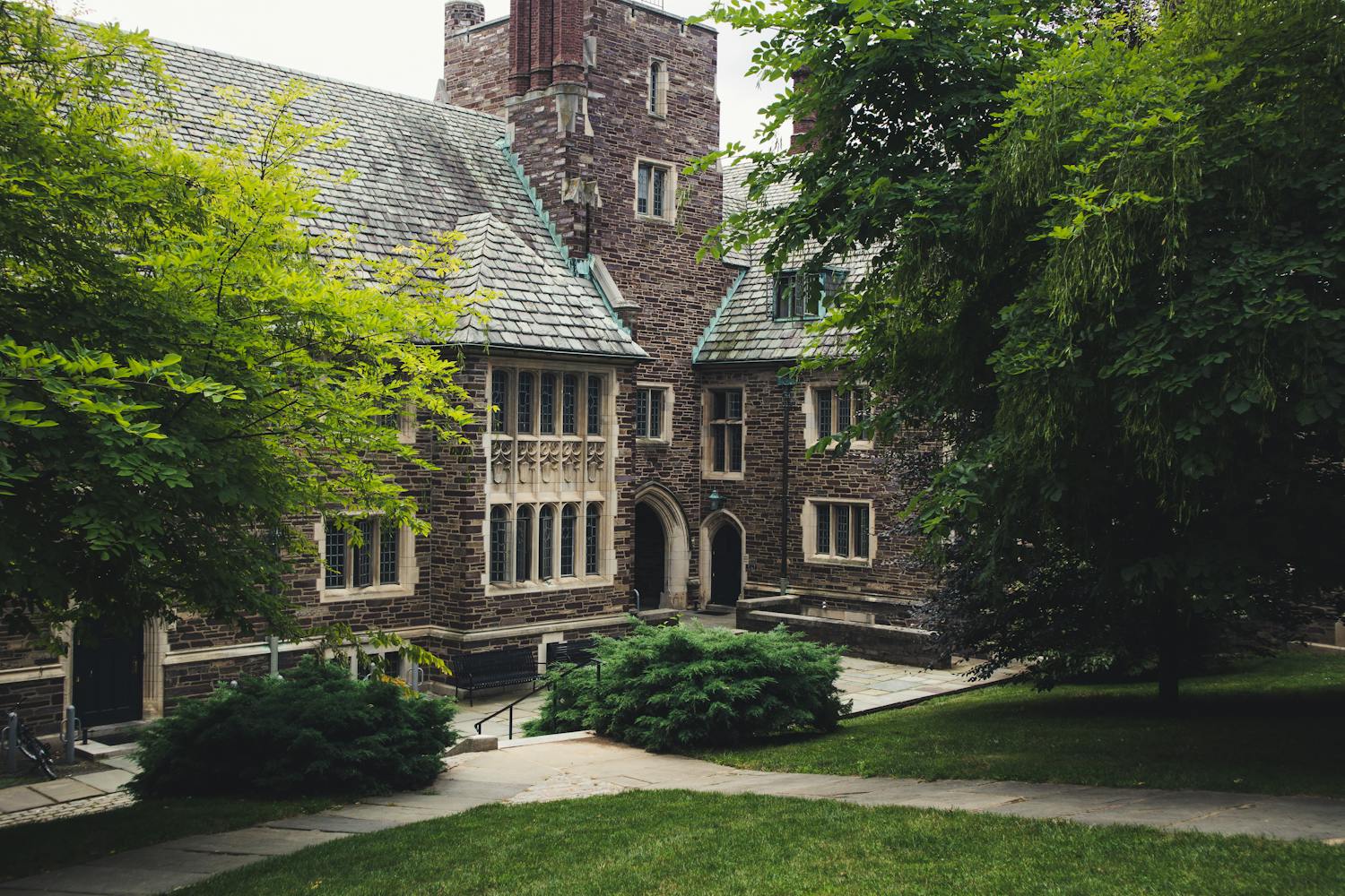Elegant Gothic architecture of Princeton University surrounded by lush greenery