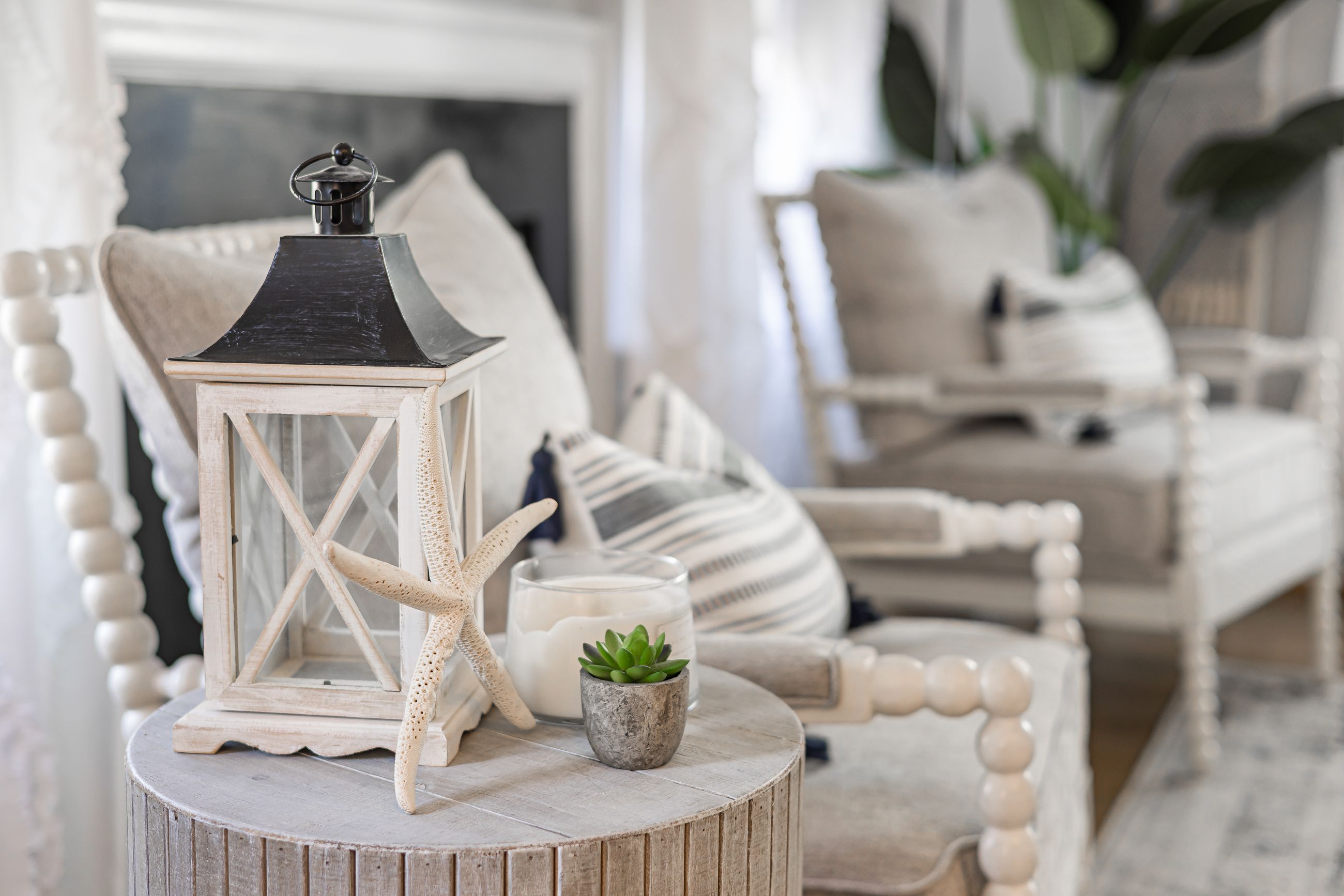 Elegant coastal living room with natural textures and warm neutral furniture