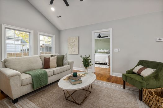 A serene modern living room showcasing elegant furniture and decor with a cozy atmosphere.