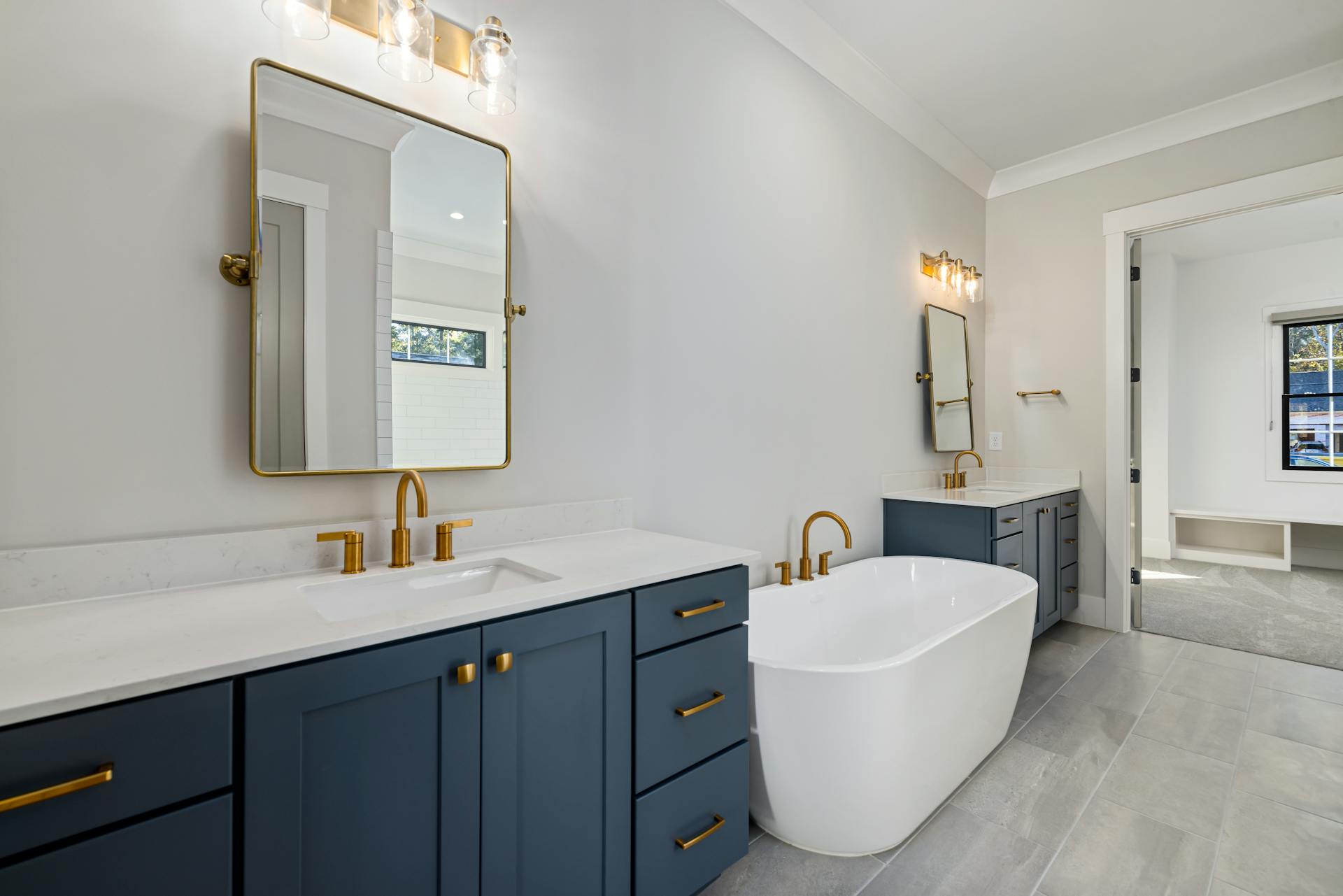 A Bath Tub in Between Bathroom Counters