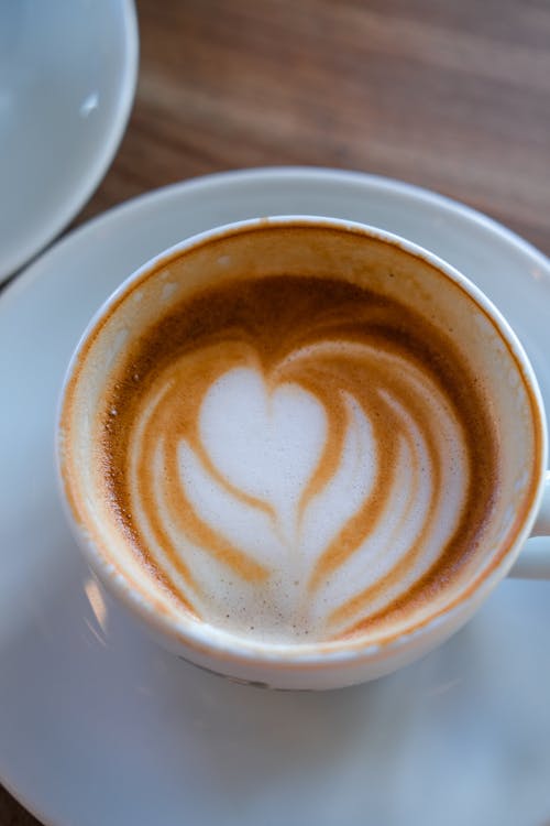 White Ceramic Cup with Coffee