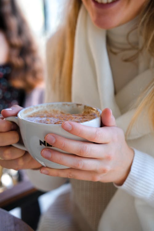 Free Person Holding White Ceramic Mug with Hot Drink Stock Photo