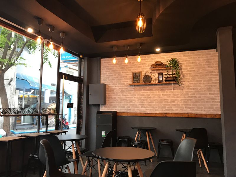 Warm, welcoming interior of Grounded Coffee Co. in Fitzroy with natural light
