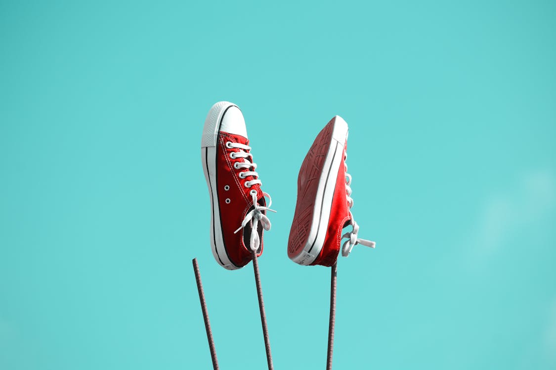 Free Pair of Red-and-white Low-top Sneakers Stock Photo