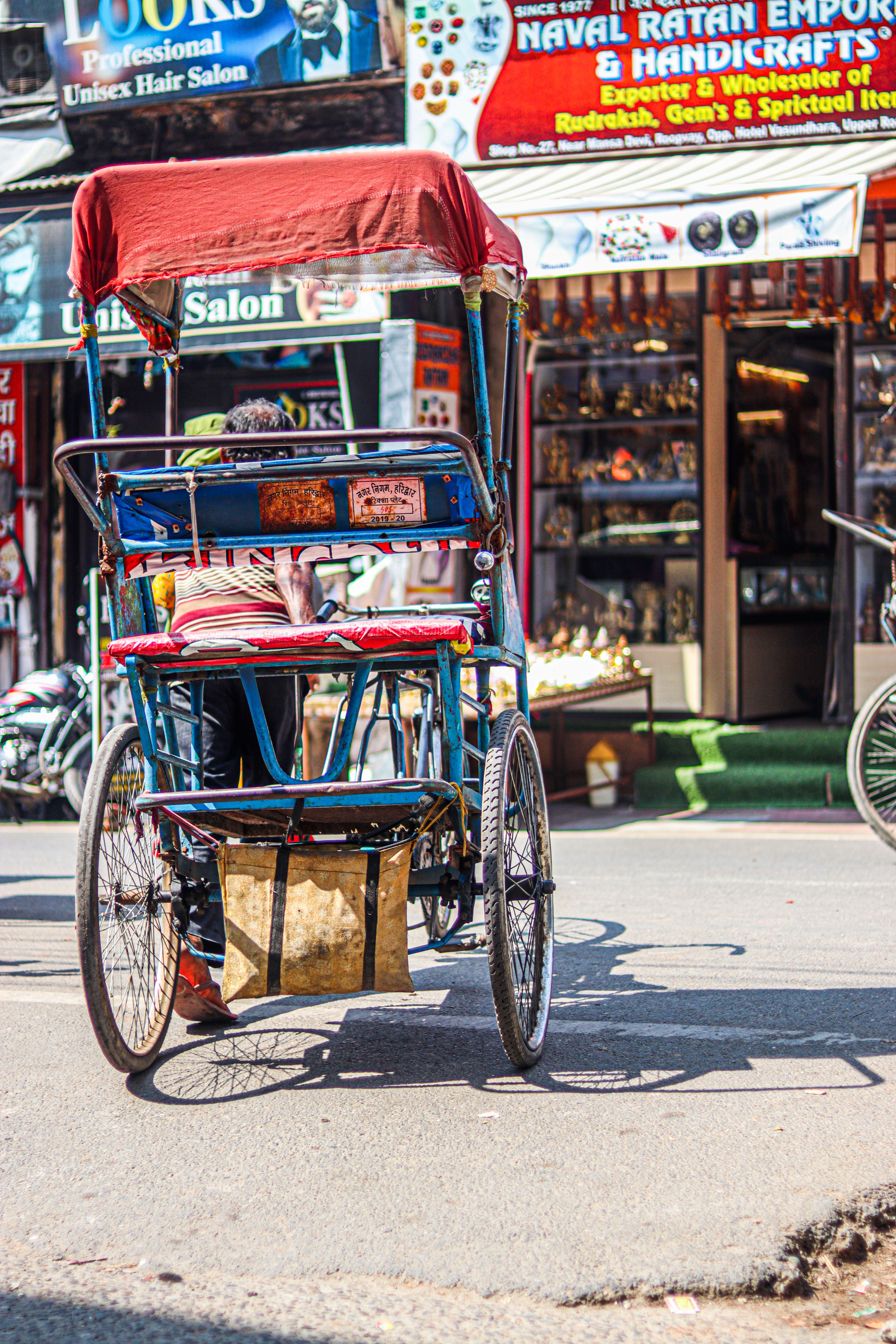 Photo Of Man Riding Auto-Rickshaw · Free Stock Photo