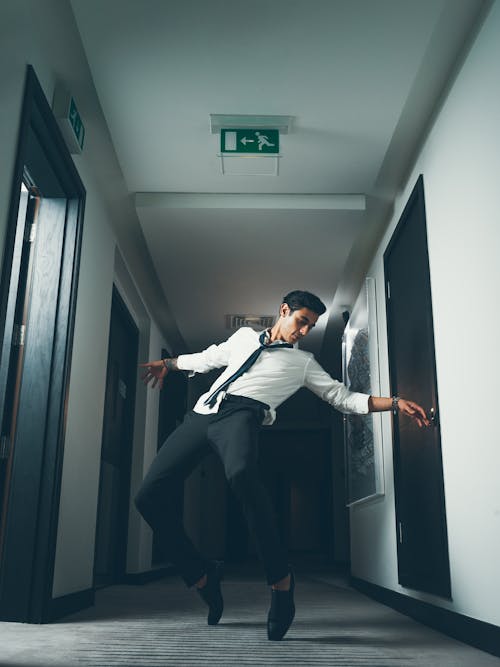 Free Man Break Dancing on Hallway Stock Photo