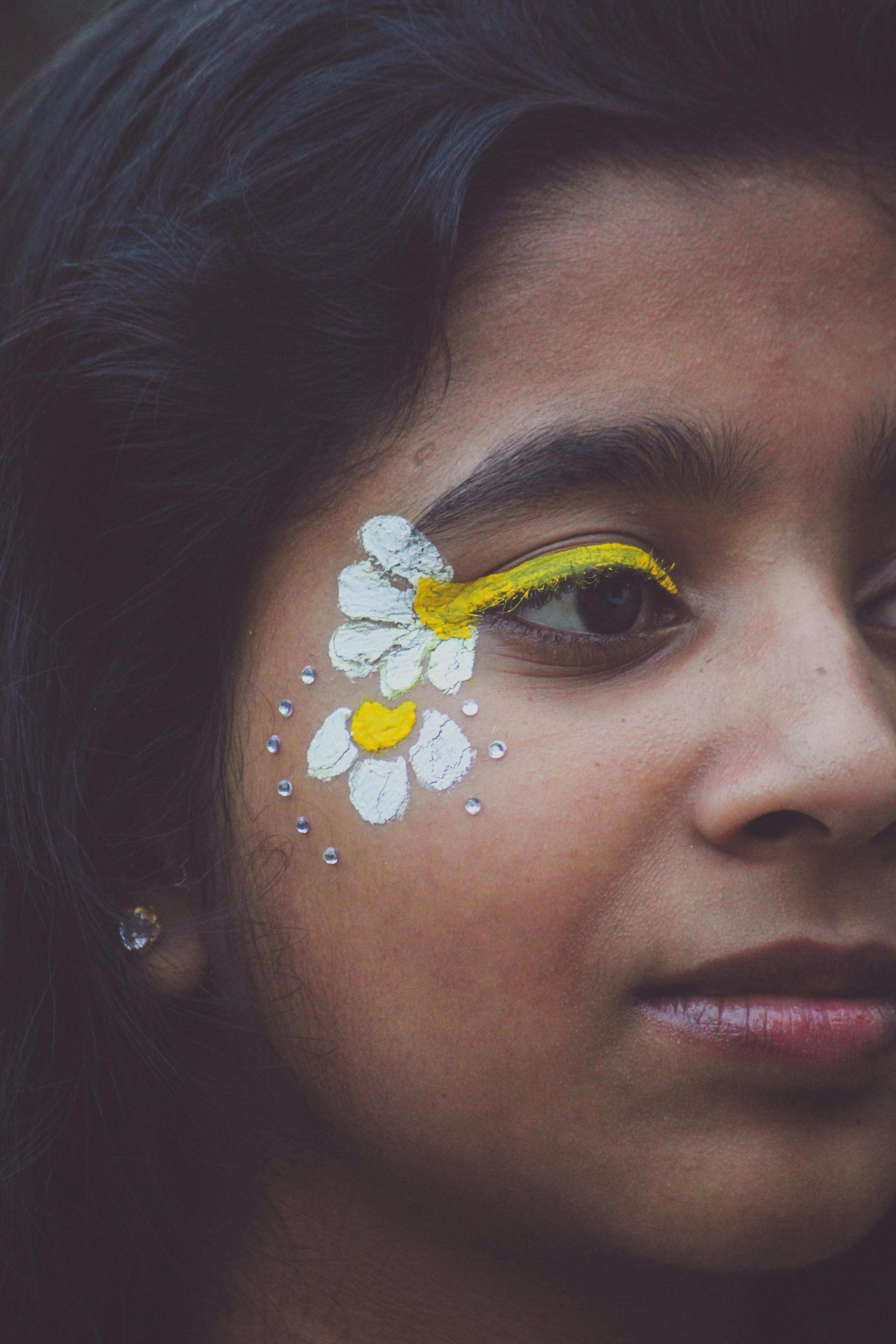 Woman With Silver Face Paint · Free Stock Photo