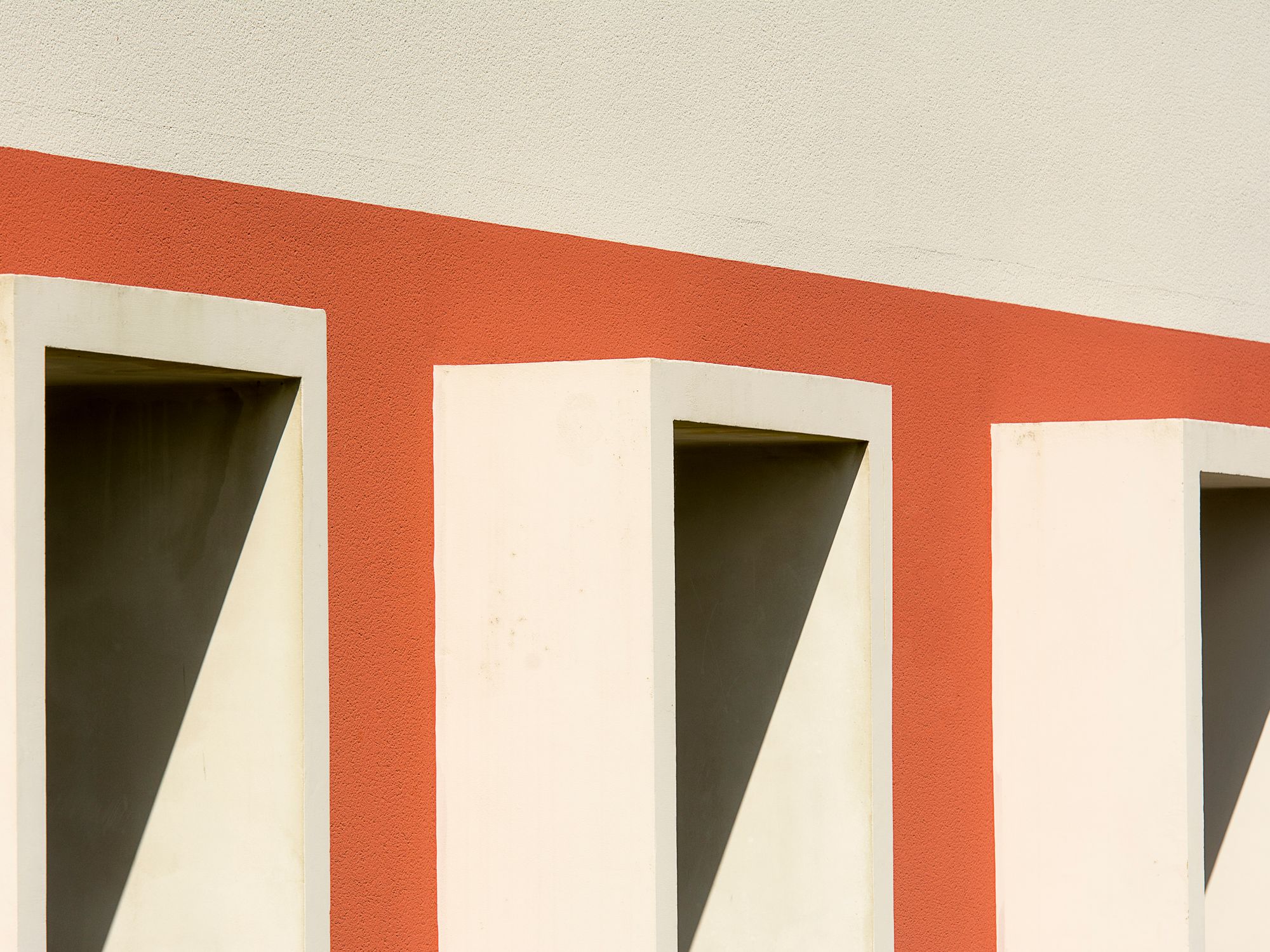 Exterior Painting in Hatch End, Harrow — painter refreshing a house exterior in weatherproof paint