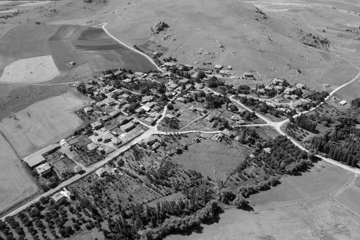 Black and white aerial shot showcasing a rural village layout in Kırşehir, Türkiye.