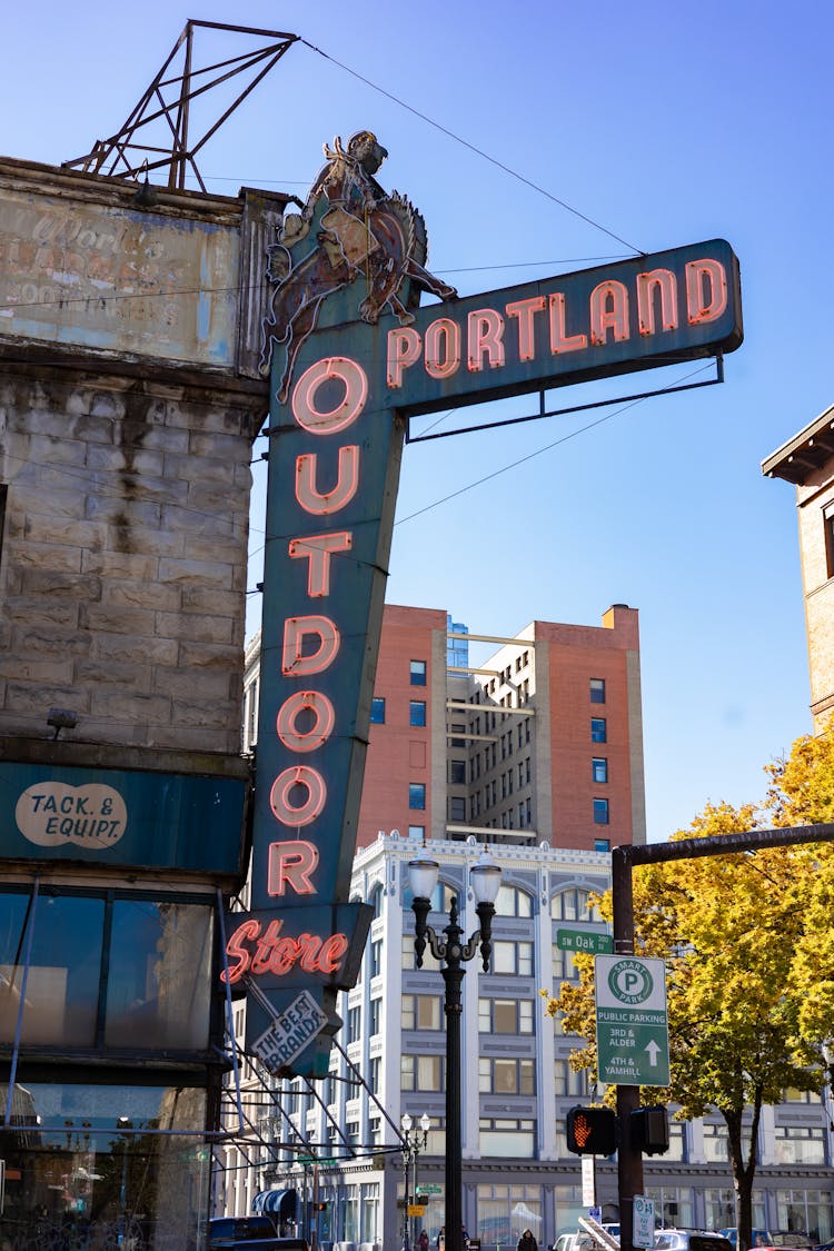 Store Signage In Front Of Brown Concrete Building