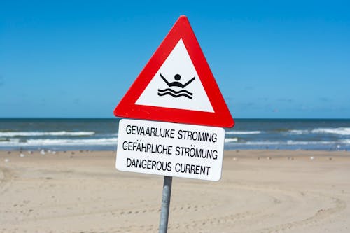 Warning on the Beach Shore
