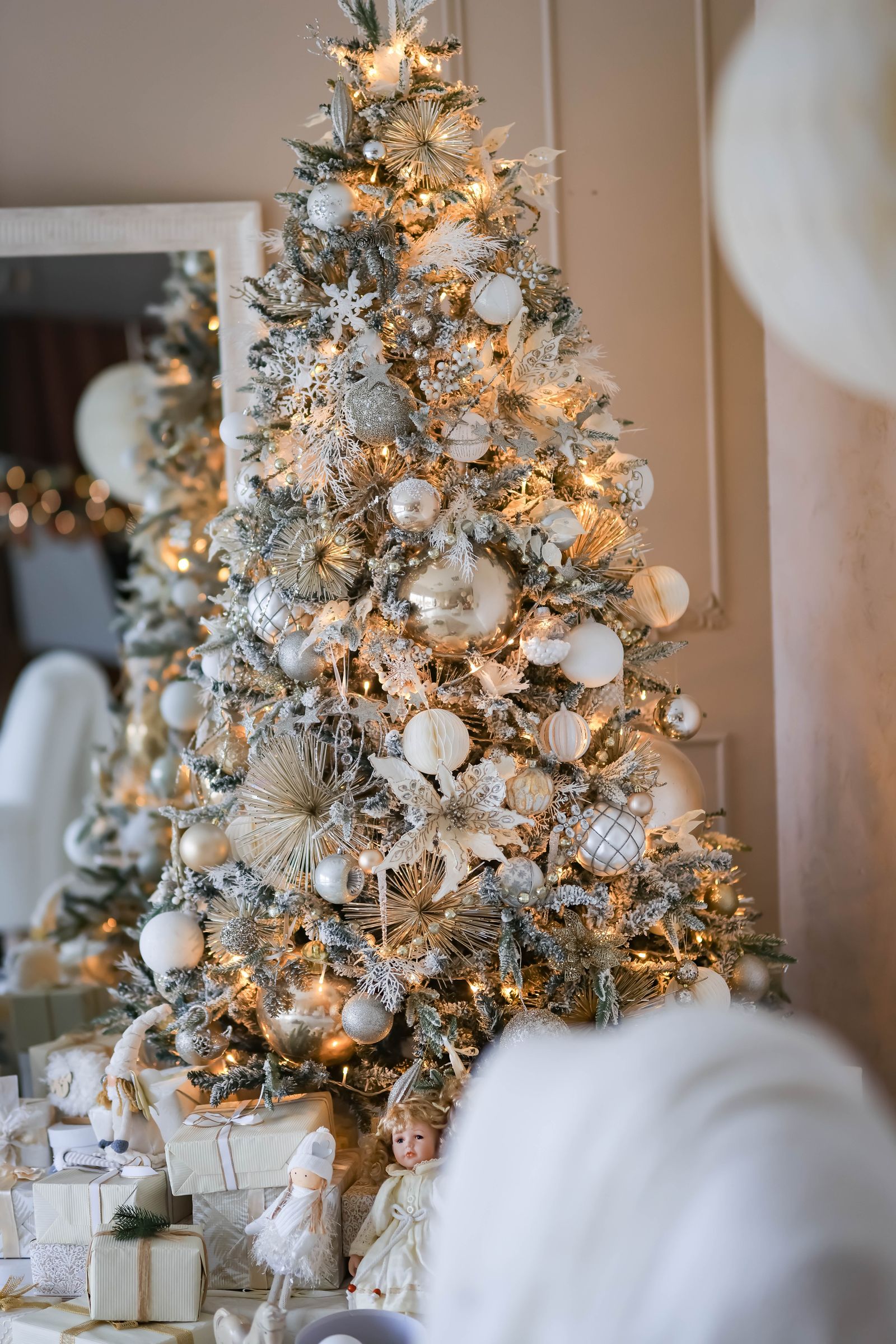 A decorated 7ft pre-lit Christmas tree in a bright UK living room