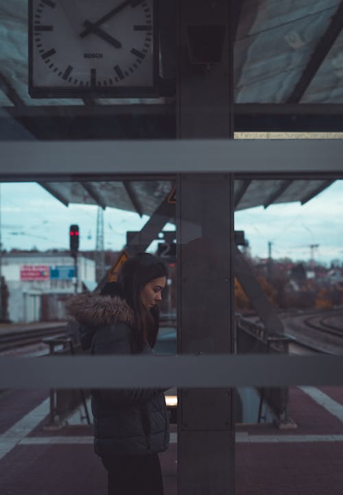 Brunette Woman Waiting for Train