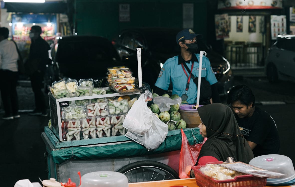 Free Tropical fruit seller Stock Photo