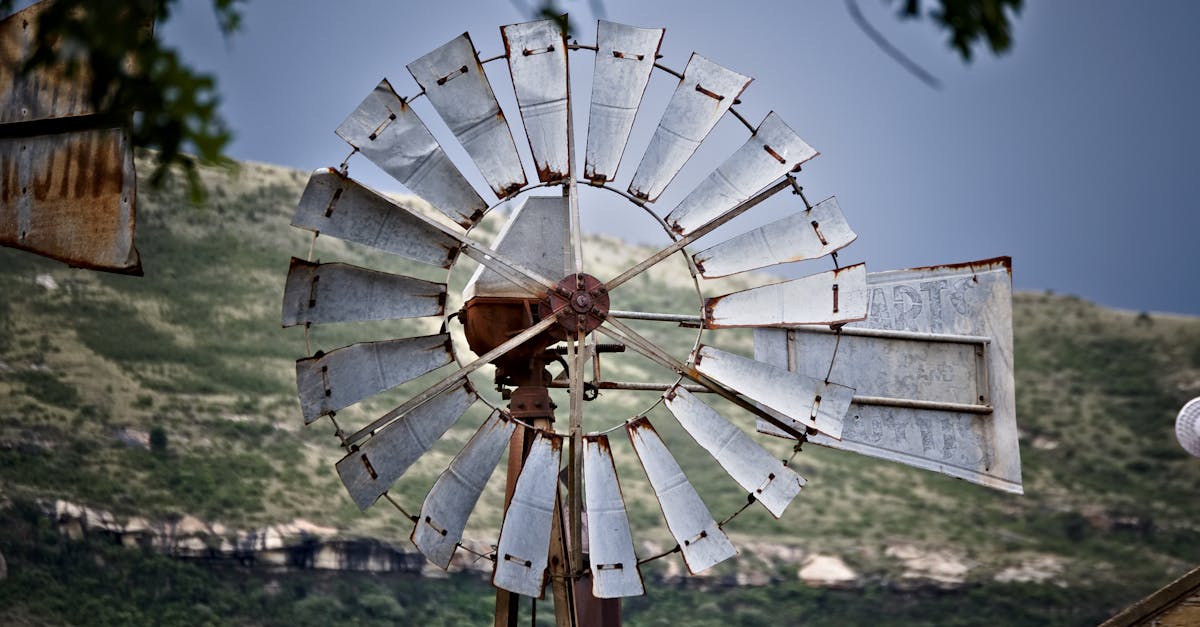 Close-Up Photo of a Rusty Windmill · Free Stock Photo