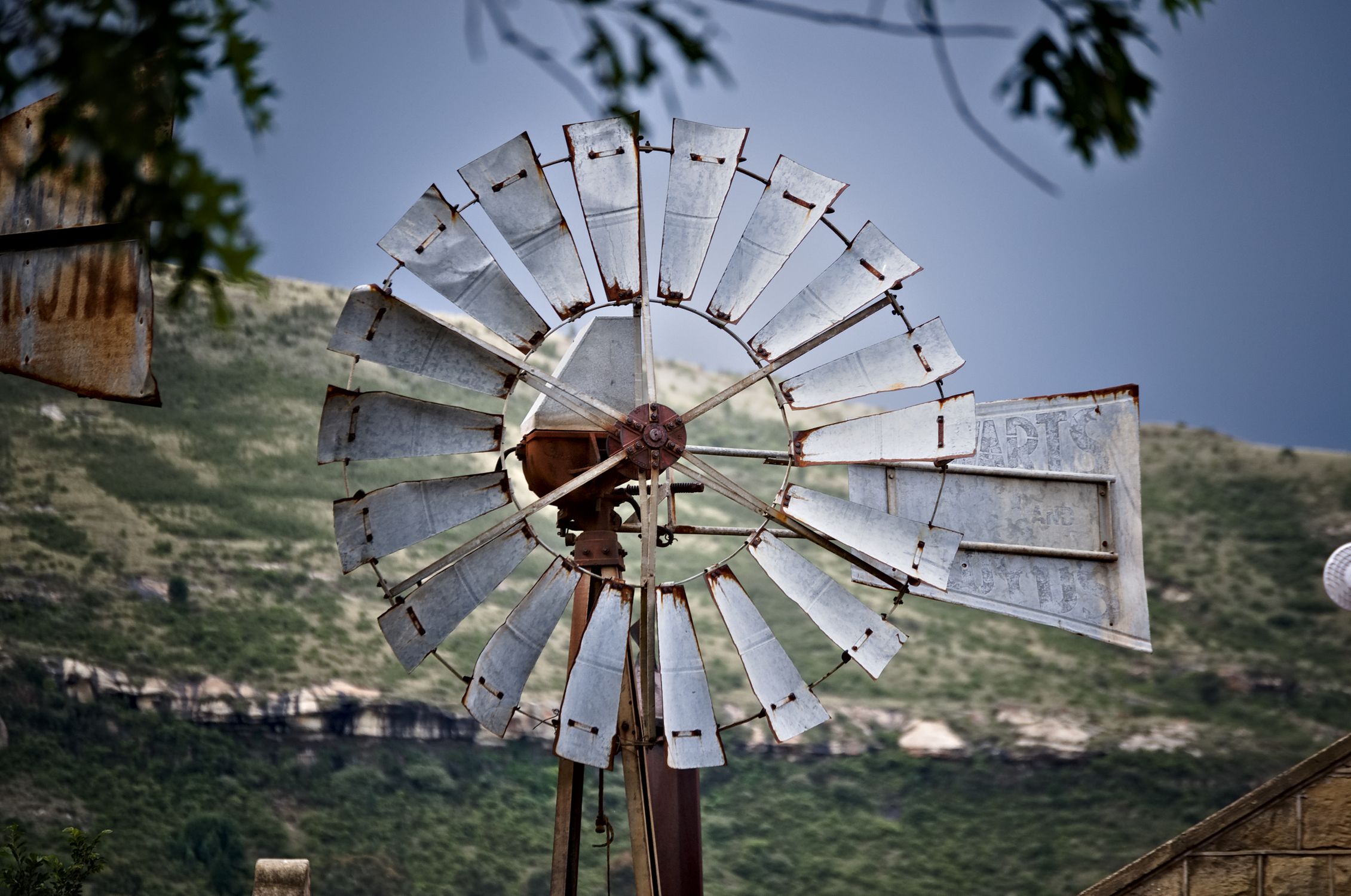 Close-Up Photo of a Rusty Windmill · Free Stock Photo
