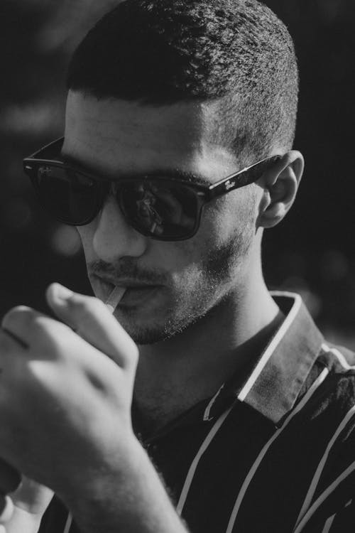 Face of Man in Sunglasses in Black and White