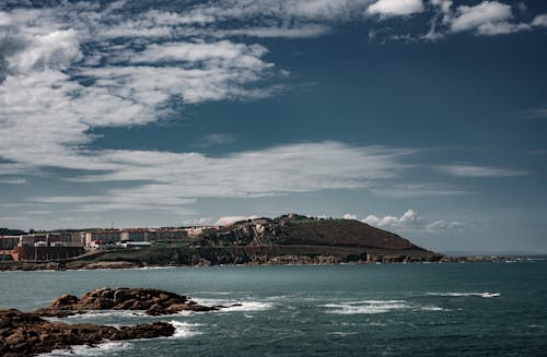 White Clouds over Seaside Town