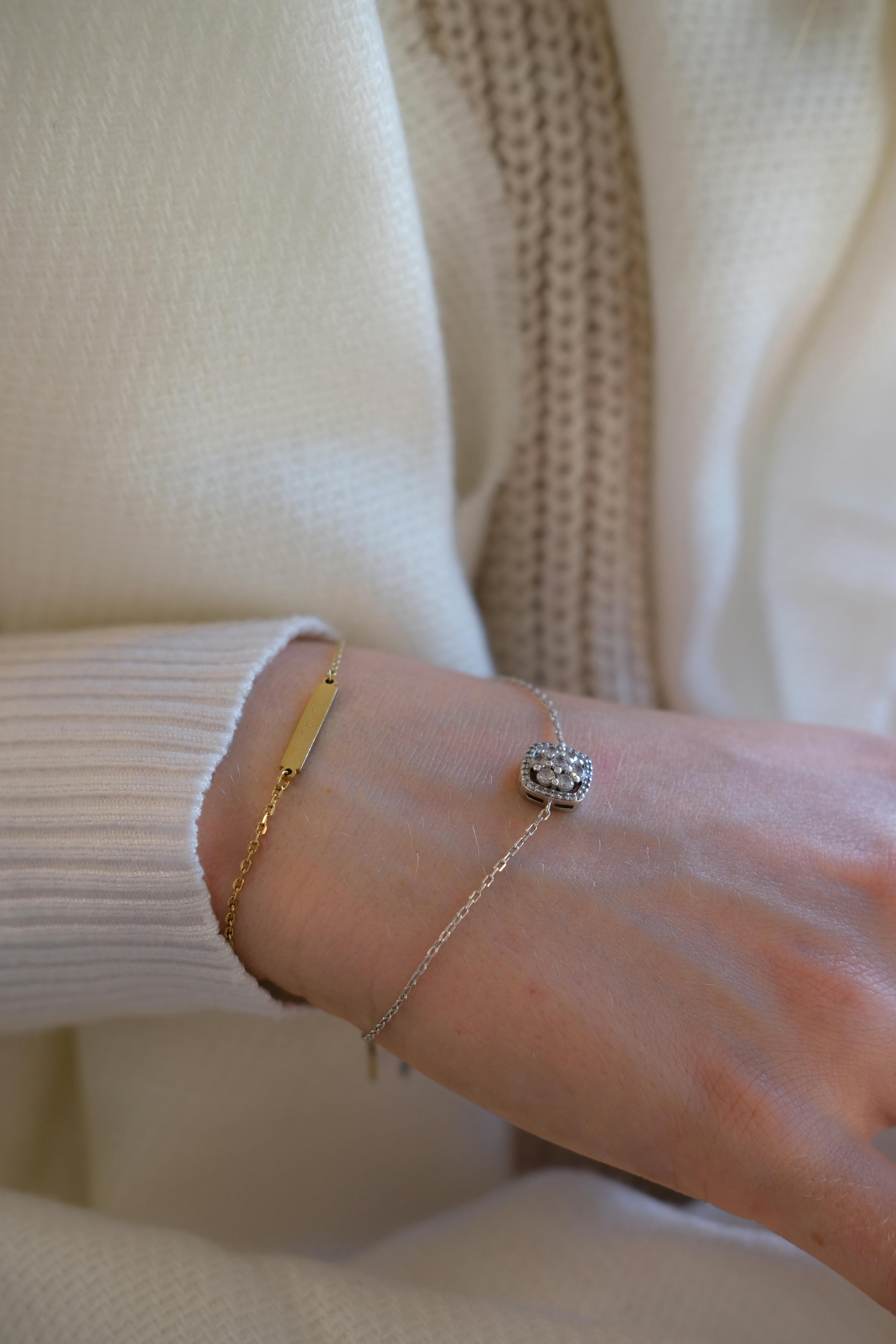 close up of gold and silver bracelet