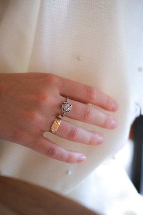 Free Close-up of an elegant hand adorned with diamond and gold rings, showcasing style and sophistication. Stock Photo