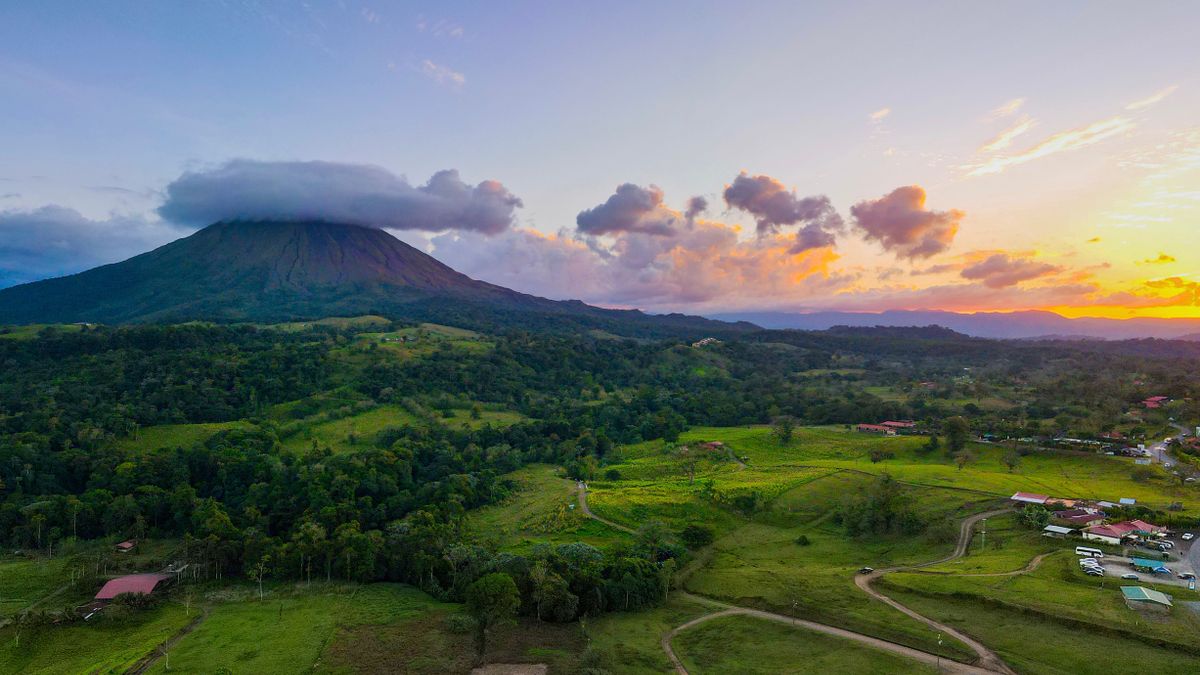 Arenal volcano in Costa Rica rising through green jungle landscape