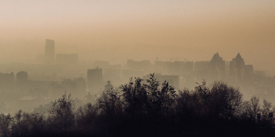 Hazy city skyline in Malaysia affecting mental health and air quality