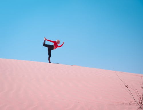 Person Standing on Desert