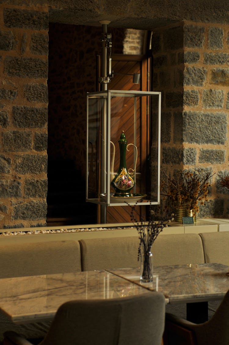 Table With Chairs And Vase In Home Interior