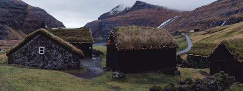 Landscape of Houses with Grass Roofs in Mountains on the Faroe Islands
