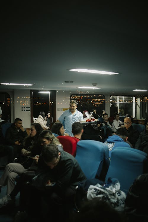 Passengers on Ferry at Night