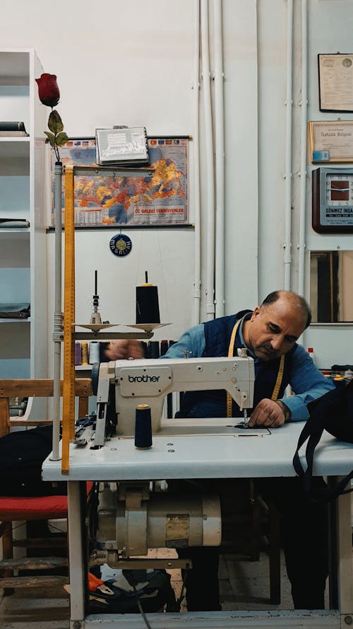 Tailor Using a Sewing Machine