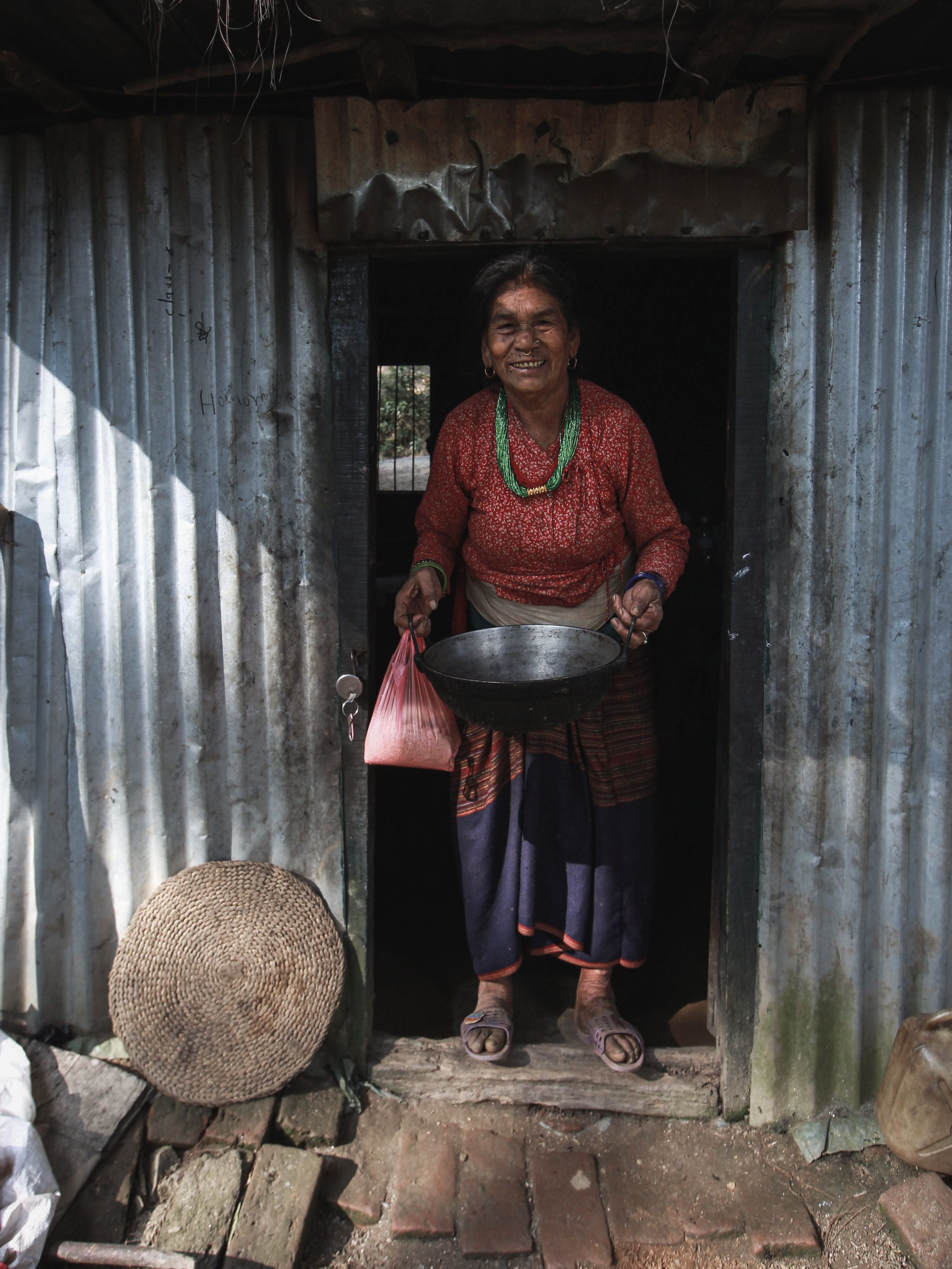 Village Women at Their House supporting the community