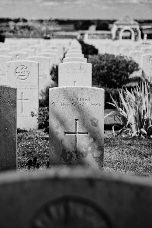 Grayscale Photo of Tombstones