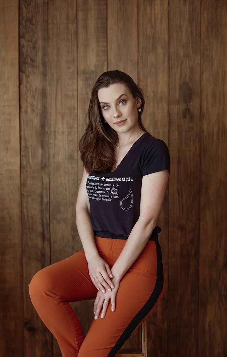 Portrait Of A Woman Sitting On A Chair 