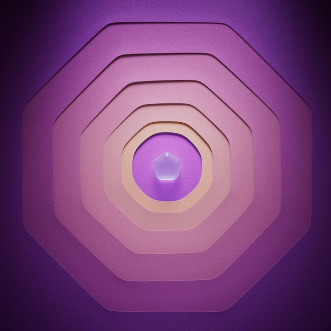 A vibrant geometric pattern in purple featuring layered shapes and a central gem.