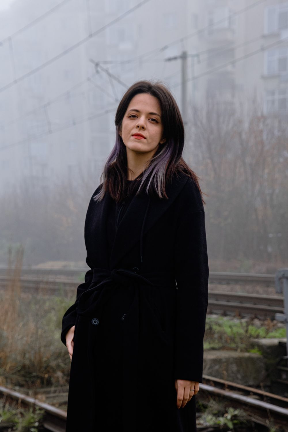 Portrait of a Woman in a Black Coat · Free Stock Photo