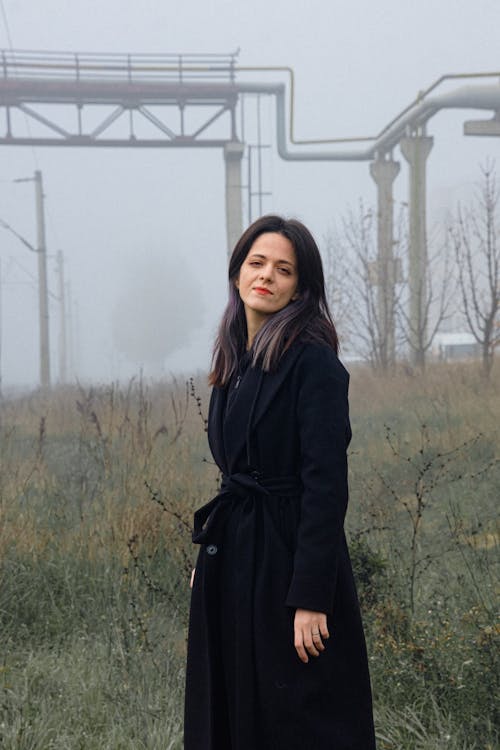 A Woman in Black Coat 