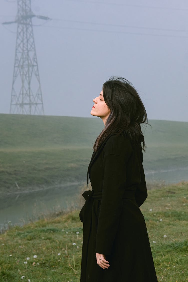 Woman Wearing A Black Coat 