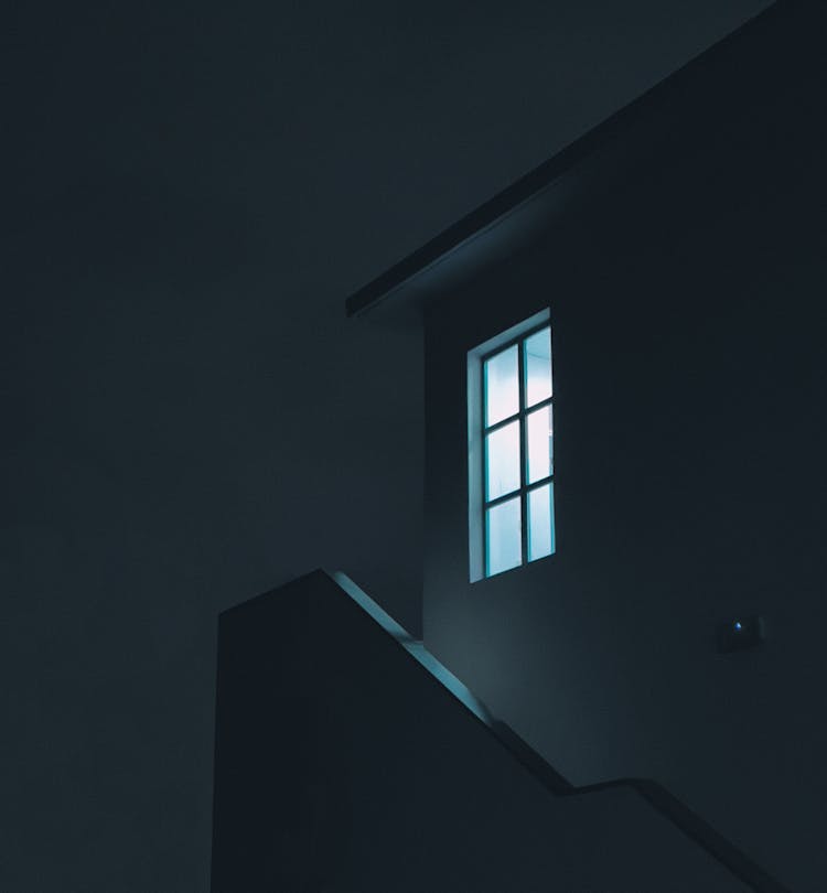 Window Over Stairs Wall By House At Night