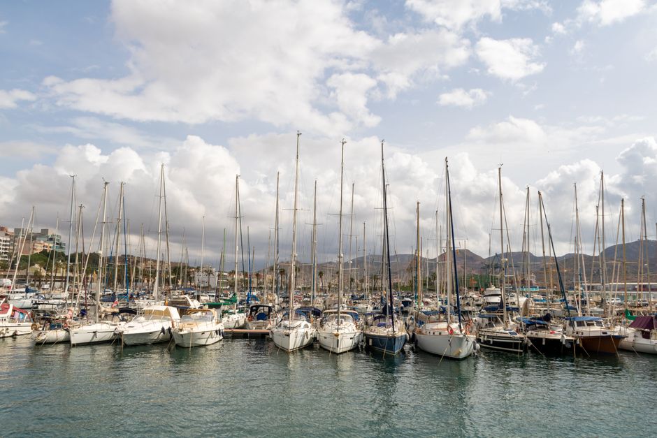 Outstanding Catamaran Sailing Cruise in Barcelona Review: A Relaxing Mediterranean Escape for Just $16 Review 2026 - A picturesque view of sailboats moored in the marina of Cartagena, Spain against a cloudy sky.