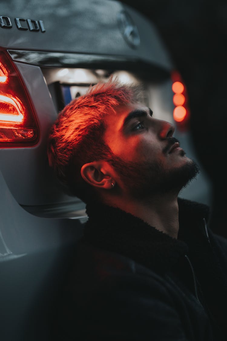 Close Up Photo Of Bearded Man Leaning On A Car