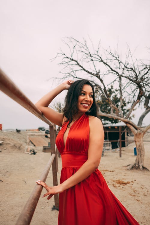 Woman Posing in Red Dress