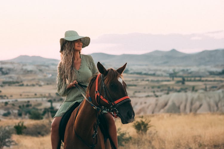 Blonde Woman On Horse