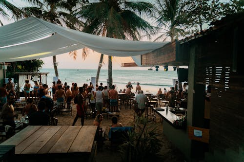 Seaside Bar Customers at Patio