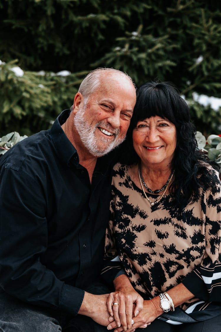 Man And Woman Posing Together