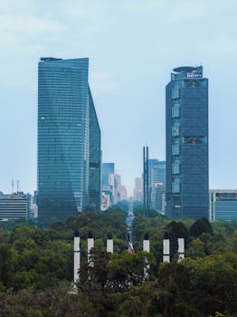 Stunning view of Ciudad de México's skyline featuring Torre Reforma and BBVA buildings.